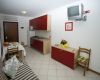 Living room with kitchen